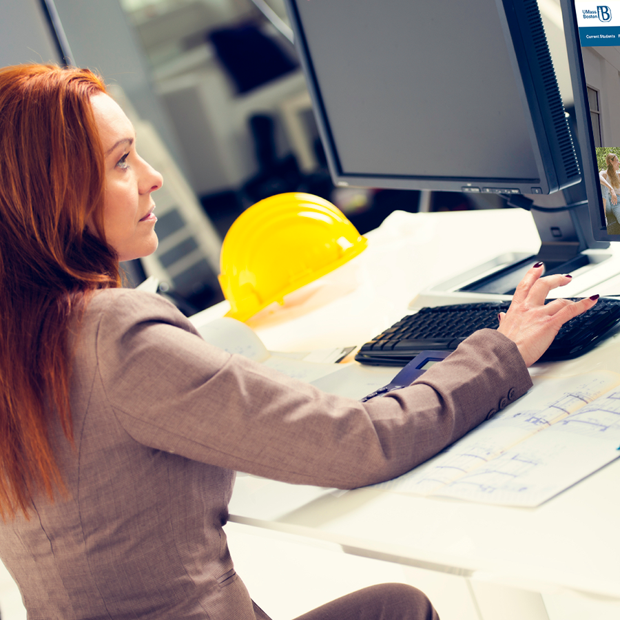 Redhead Woman at Computer